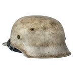 "Battle Battered" Stahlhelm M42 Wintertarnung "Battle Battered" Stahlhelm M42 Wintertarnung - Mon Casque M1
