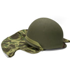 Casque Complet US M1 Pacifique avec couvre casque réversible vue posé au sol avec le couvre-casque.