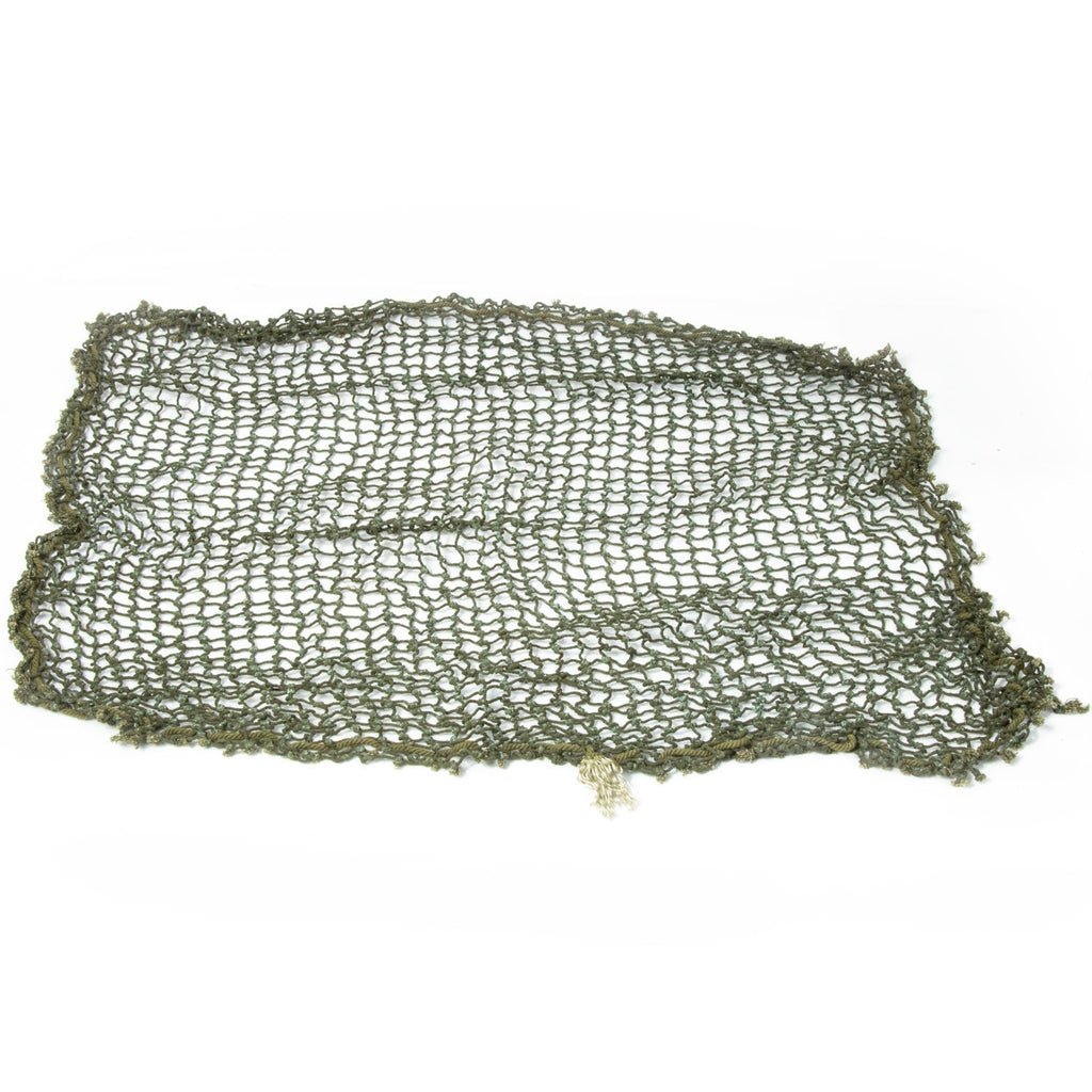 Filet petites mailles original pour casque US M1 à plat sur la sol