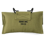 Pochette à pansement M-1924 portée au ceinturon vue arrière