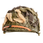 Exemple de toiles de jute montées sur un casque US M1 infanterie